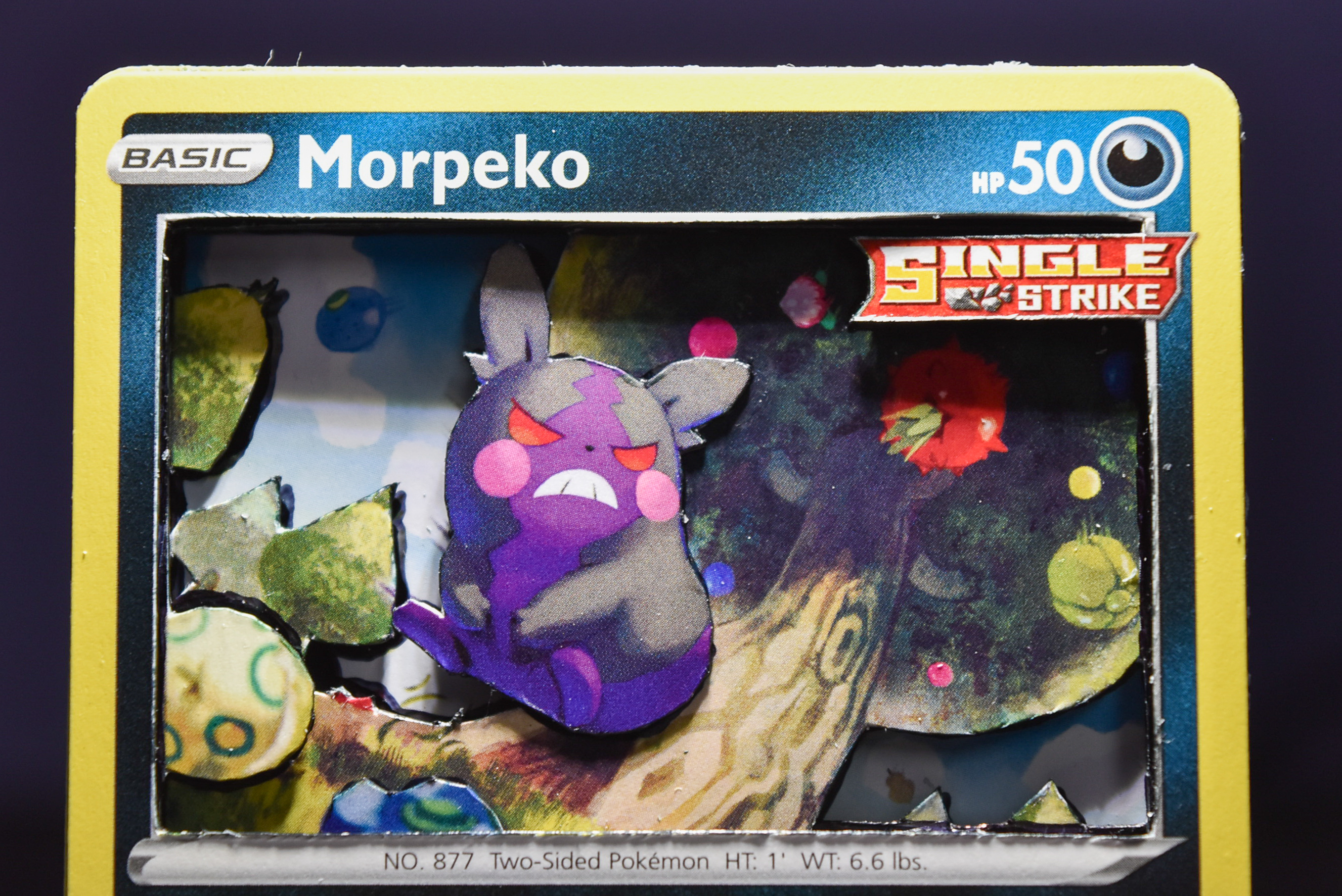 A 3D Morpeko card.